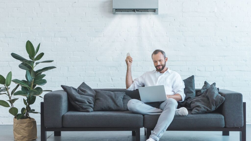 person enjoying AC in their home